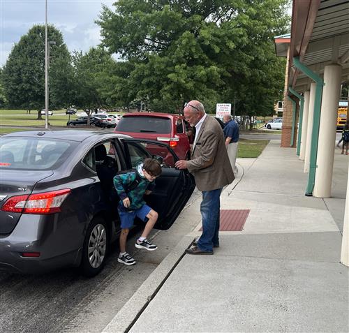 car line unloading kids